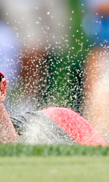 McIlroy charges up leaderboard as Tiger struggles at Valhalla